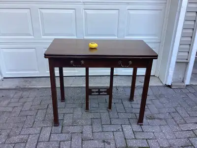 Wooden card table that can be expanded with up to three leaves, View more