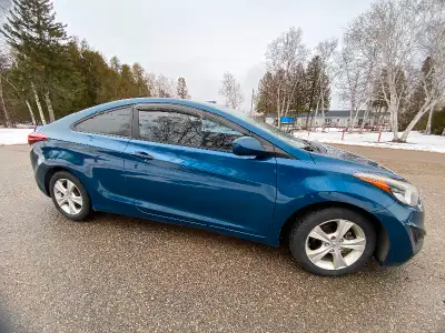 Blue Hyundai Coupe