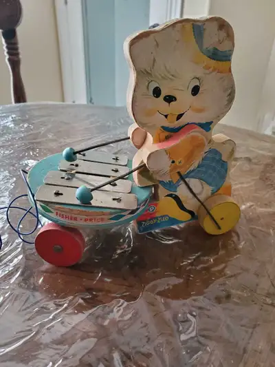 25 dollars wooden fisher price toy, View more