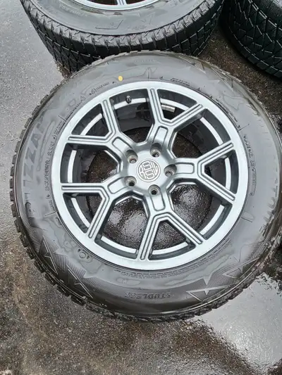 Winter tires used for a couple seasons. Id say more than half of the tread remains. Originally on a...