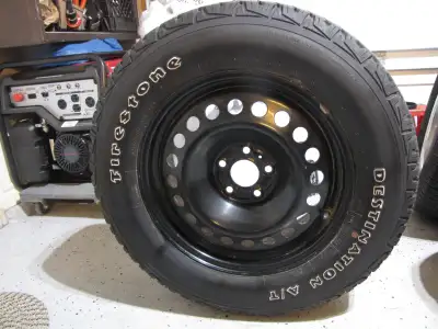 4 Firestone Destination A/T P245 65R17 105T M&S tires on black steel rims. App. 30,000 kms of winter...