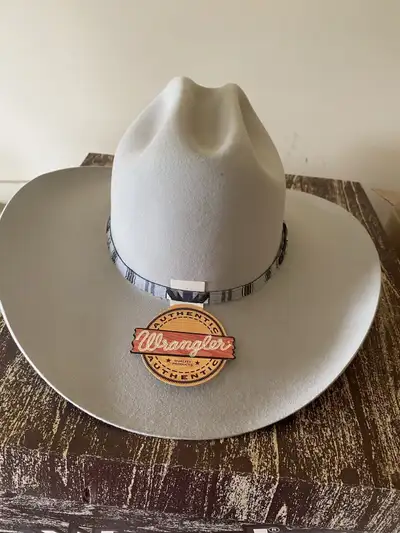 I have 2 brand new, still in box Wrangler hats that are left over from when my Dad had a western wea...