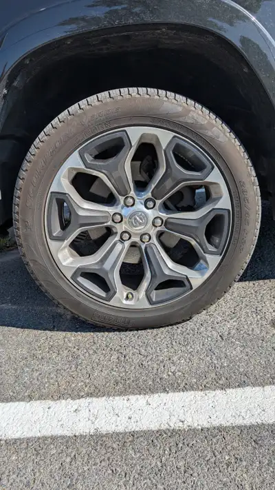 4ea RAM 1500 Limited 22 inch wheels with Pirelli Scorpion tires. One rim is split and needs to be re...