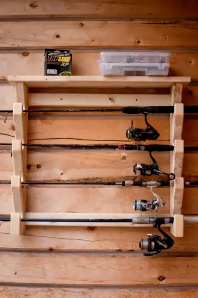 Fishing rod holder / shelf / organizer Great Christmas gift and finally the chance to clean up the s...