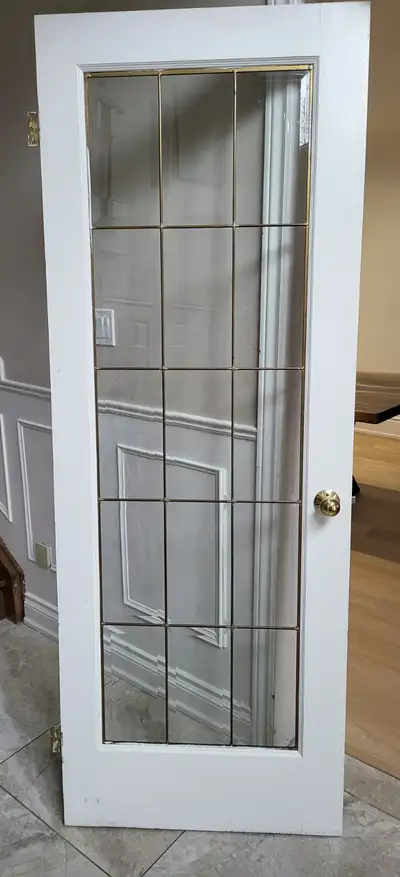High-quality solid wood interior door with decorative glass panels. Great for adding natural light b...
