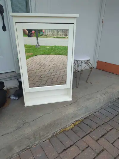 Bathroom cabinet/mirror. Used but great condition and good value. Unfortunately does not fit in my b...