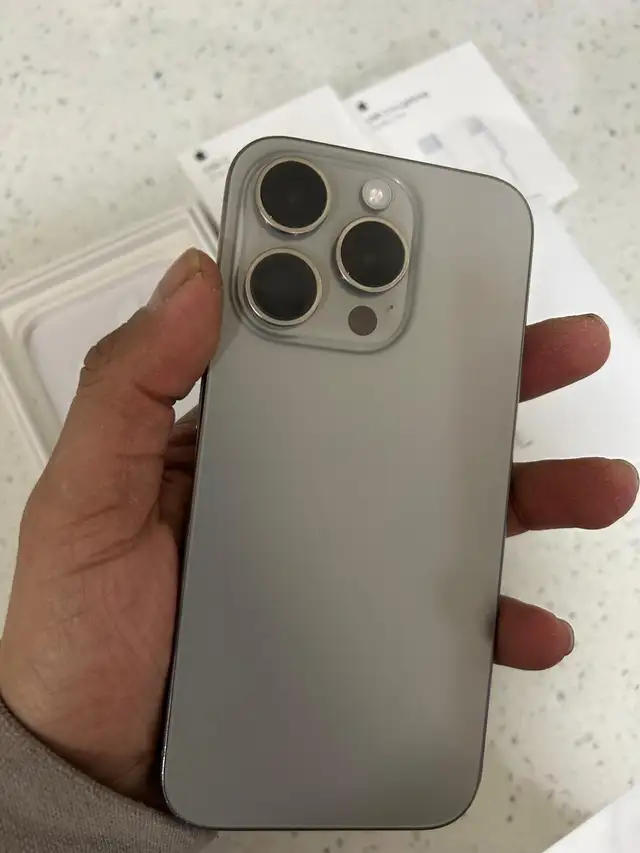 Natural titanium iPhone 15 Pro 128 GB **Airpods Pkg/Deliver**63008306801665124