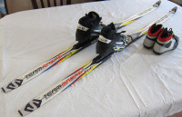 SALOMON WAXLESS SKIS WITH POLES AND SKI BOOTS 5-8 YRS OLD KIDS