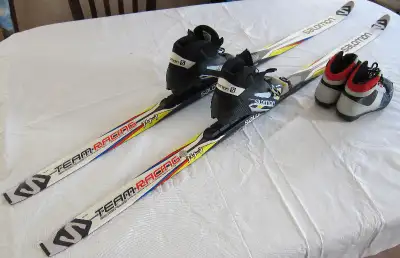 SALOMON WAXLESS SKIS WITH POLES AND SKI BOOTS 5-8 YRS OLD KIDS, View more