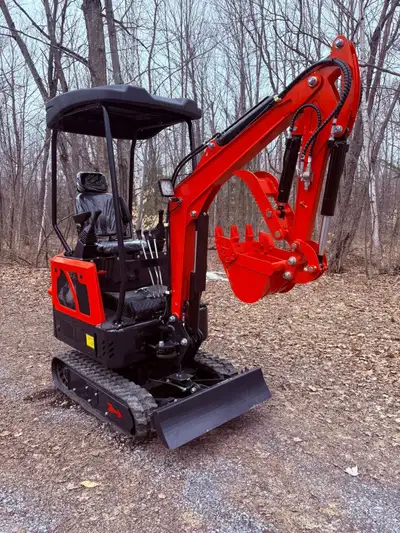 18HP Kubota D722 diesel engine Operating weight 3800lbs Dig depth 6.3ft Swinging boom Expandable tra...