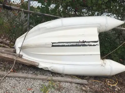 8.5 ft Brig inflatable RIB. Has a seam that separated in the front tub. Both side tubes are fine. Co...