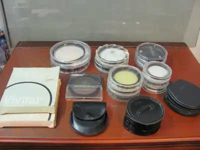 28 Various Lens Filters. 49mm. Cross, UV and UV Haze. Starlight, N.P.S. Mist, C.S. 4X, 1A, NPS Soft...