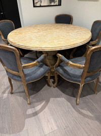 Solid wood 60 inch round with 6 grey chairs