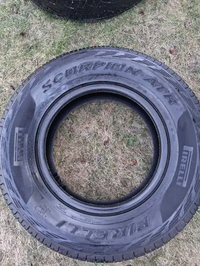 Like new 265/70 R17 Pirelli Scorpion ATR all season tires for sale. Used one summer only. 403 852 35...