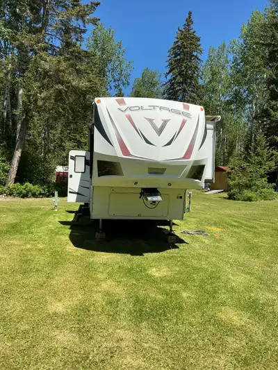 Great toy hauler. 10 ft garage. 2 queen beds in garage. Queen bed up front. Stand up glass shower. 3...