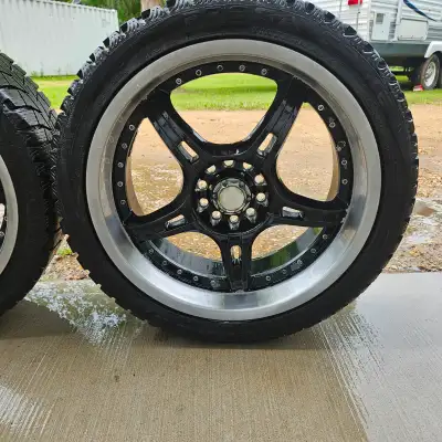 Presa Spire Wintermaxx tires on mags 225/40 R18 92T 5 X 4.5" bolt pattern Lots of tread left. Excell...