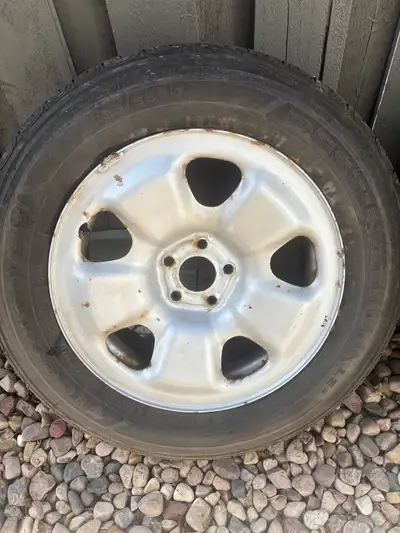 4 mounted Firestone Destination all season tires with about 50 % wear. Ready to install on Jeep Cher...
