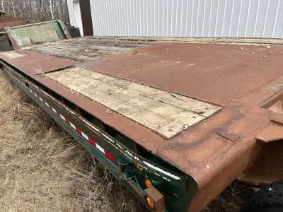 We have a 16 wheel lowbed that has easy load ramps for Older operators. The deck measures 10ft X 24f...
