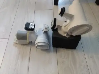 New Whirlpool Duet washer Drain Pump, just purchased but not using it. Second is from the old mashin...