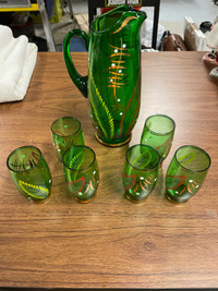 Beautiful green glass and pitcher set with floral designs