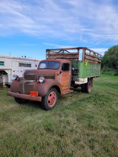 1947 Dodge 2 ton running with a working hoist. Located in Radisson Sask.