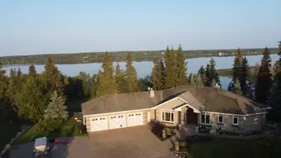 One of a kind, Lake Front Acreage. 3 miles out of town. Bungalow, 2595 square foot. 4,000 square foo...