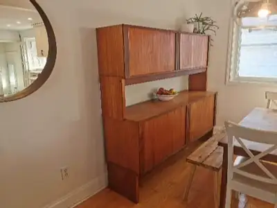 Mid century modern Teak Hutch with sliding tambour doors. We are moving in 7 days and I'd like this...