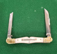 3 1/2" Double Bird's Head Bolsters, Swell Center pocket knife