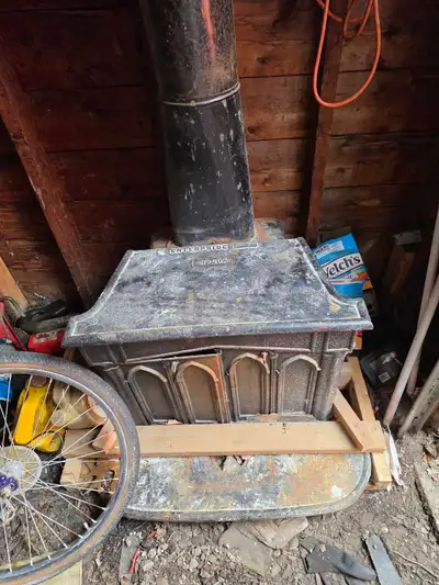 The Enterprise Wood Burning Stove No. 20A is an older, cast-iron wood cook stove made by the Enterpr...