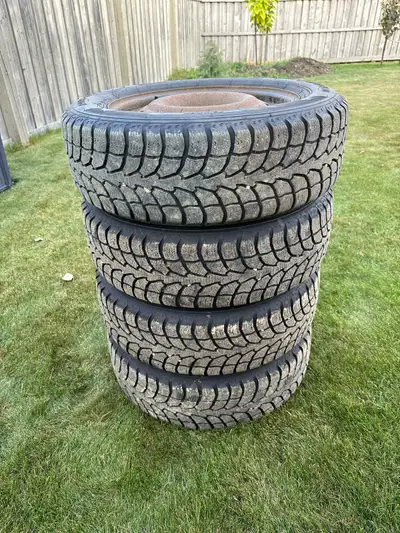 4 winter tires on steel rims, used for 2 seasons. Driven on our 2013 Kia Sportage, selling because w...