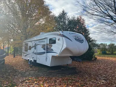 I'm selling a 2010 Chaparral 27-foot fifth wheel trailer, perfect for your next adventure! This trai...