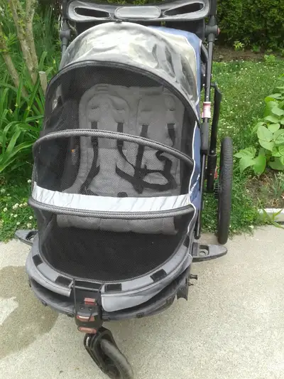 Shwin bike trailer or double stroller in good condition. Asking $170. Delivery is available.