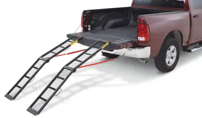 Folding set of 2 steel ramps for sale, as photo. Purchased from Canadian tire. excellent condition w...