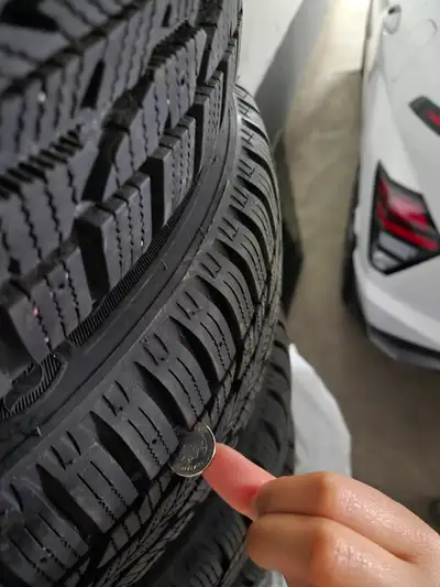 Selling 4 FIRESTONE winter tires 185/60r15/84s On rim, rarely used for only 1 winter (last winter) P...