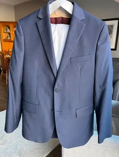 Hi This is my grandsons suit he wore once for grade 8 graduation last year. It was cleaned and inclu...