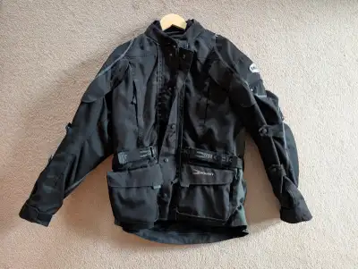 Motorcycle jacket for sale. Size: XL. Removable inner lining. For reference: I am 6 feet and 200 lbs...