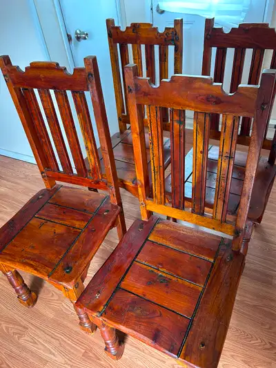 4 heavy wooden chairs, View more