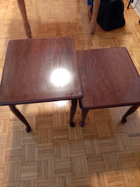 2 small brown tables