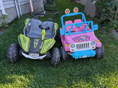 2 Power Wheels. The green Dune Racer does not have a battery.