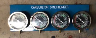 Motorcycle vacuum carburetor synchronizer for multiple carbs. Kit includes all the adapters for diff...