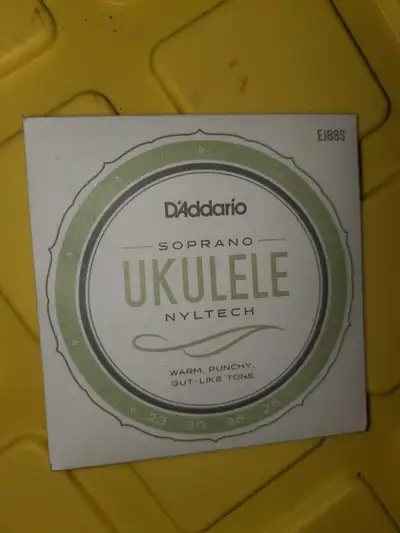 Selling a new set of D'Addario EJ88S Nyltech Soprano Ukulele Strings, known for their warm, punchy t...