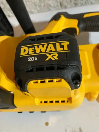 I'm selling a used DeWalt 20V XR cordless chainsaw, model DCCS620, featuring a 12-inch bar length fo...