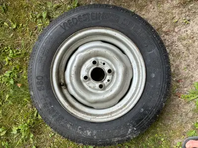 This tire is a Vredestein Sprint S80. Size is 155R 13 - 78S. It was a spare tire. It's brand new but...