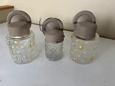 Set of three outdoor lights. Clean and ready to install crossbars included. Pick up in North Springb...