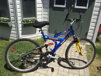Vélo CCM Dual Suspension, Revenge, 21 vitesses, 26 pouces.
