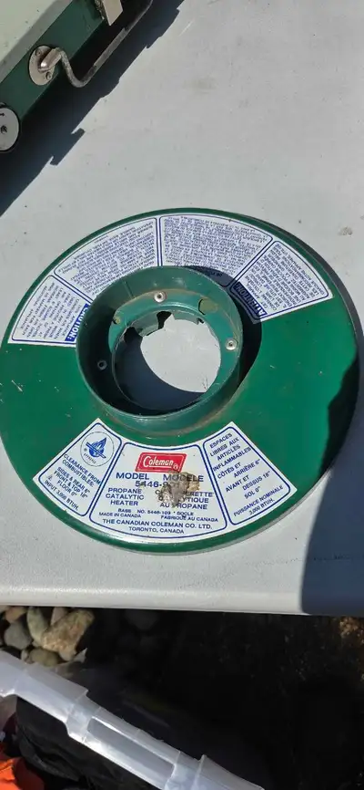 This is a used Coleman propane catalytic heater model 5446-9, ideal for providing warmth during camp...