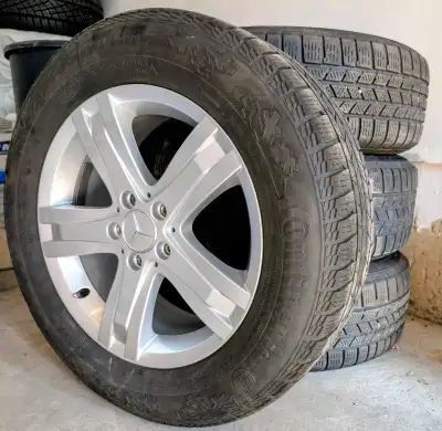 Selling a set of Mercedes Benz Original Rims + Winter Tires made by Continental 4 + 1. 235 / 60 R17...
