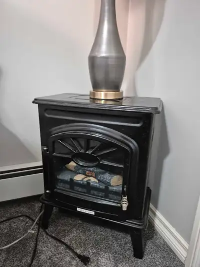 Electric Fireplace heater. Like new. Throws a lot of heat. Very good heater.