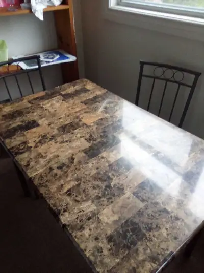 Dining room Table and 4 chairs for $25 Firm, View more