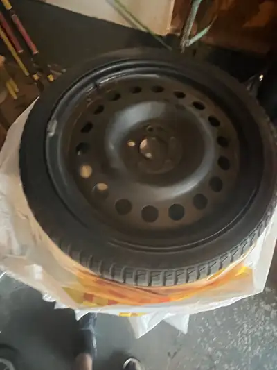 I'm selling a set of 225/40R18 winter tires mounted on rims, perfect for providing excellent tractio...